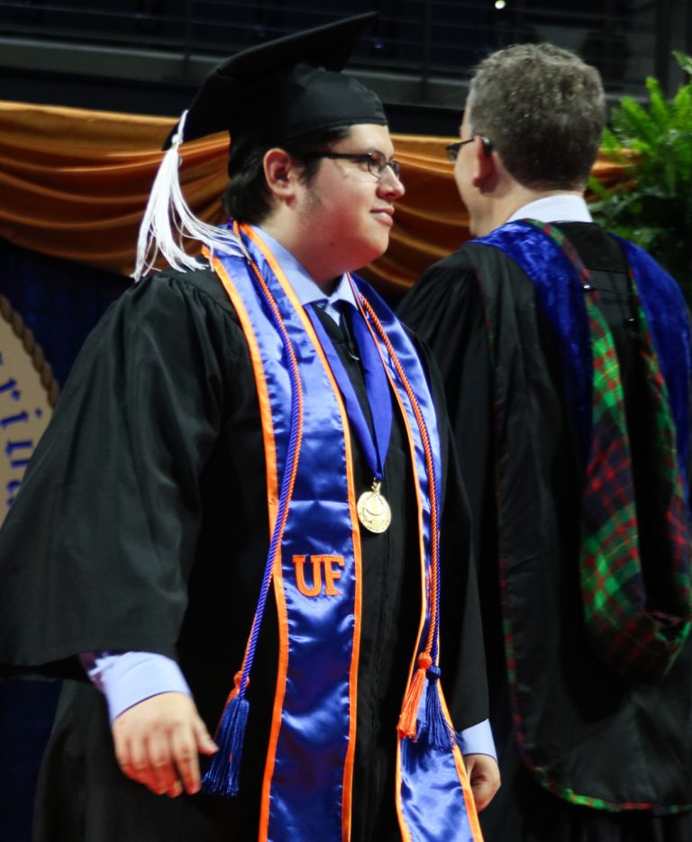 Graduating student walking