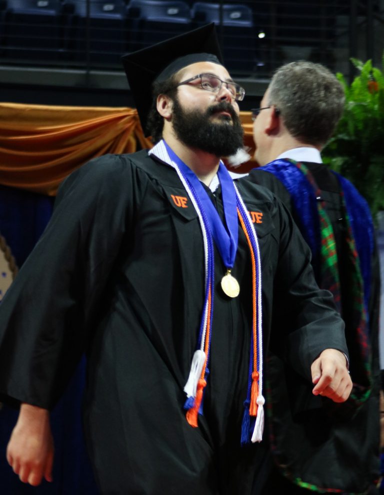 Graduating student looking up