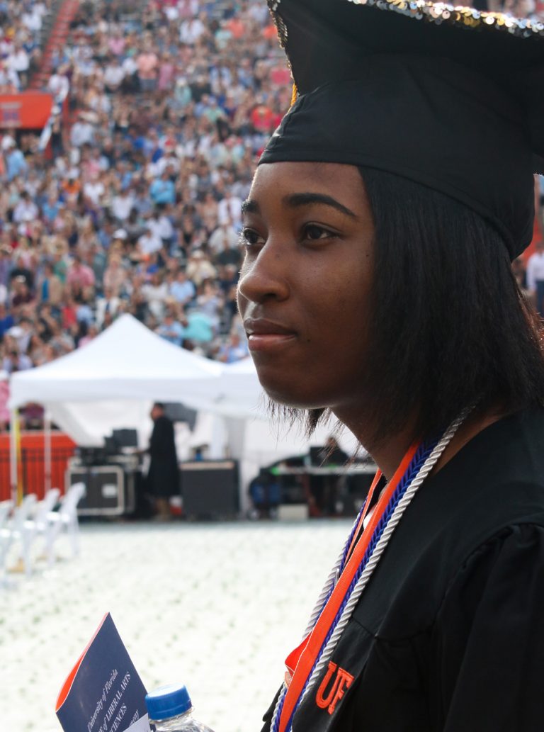 Graduating student looking into the distance