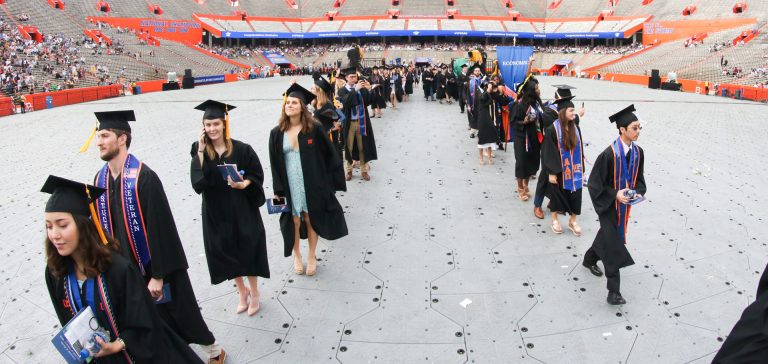 Graduating students walking into ceremony