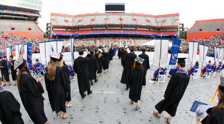 Students walking into the commencement ceremony