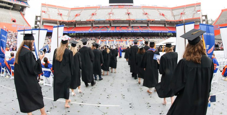 Graduating students inside stadium