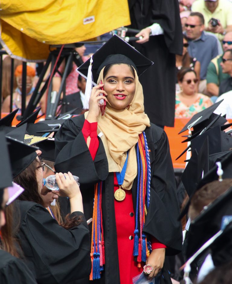 Graduating student on cellphone